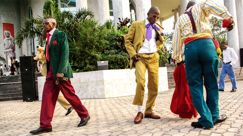 Images of men and women wearing brightly coloured suits for La Sape