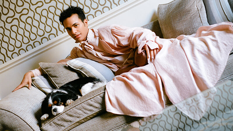 Portrait of soprano opera singer Samuel Mariño with his dog, shot exclusively for Service95