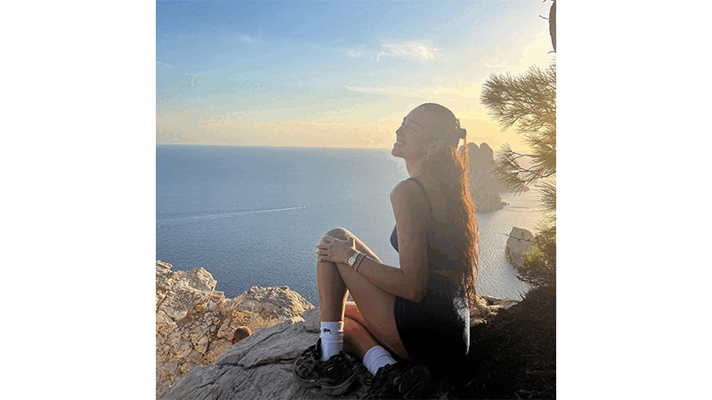 Image of Dua Lipa in Ibiza; restaurants and beaches to visit