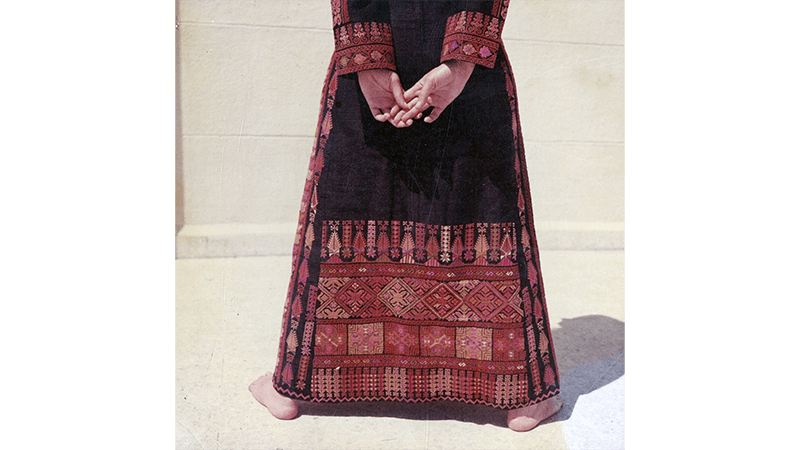 Archive image of Palestinian women wearing traditional, embroidered clothing