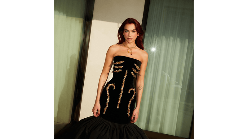 Dua Lipa wearing custom Schiaparelli dress for the 2024 Golden Globes